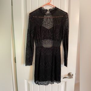 Black lace Bebe mini dress open back.